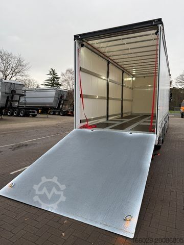 Flatbed truck with tarp VOLVO FH 500 Gabelstaplertransporter LBW Dhollandia 9t
