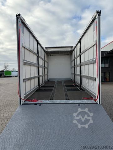 Flatbed truck with tarp VOLVO 8x2 mit Schwerlast-Ladebordwand Rampe Stapler