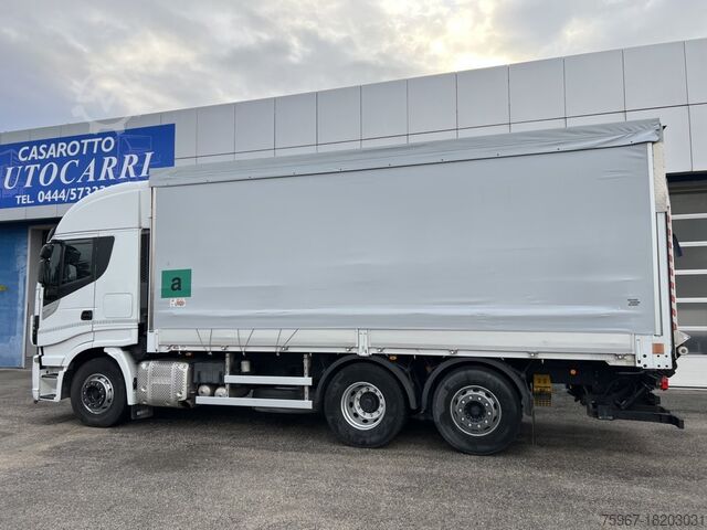 Flatbed truck with tarpaulin Iveco Stralis 510