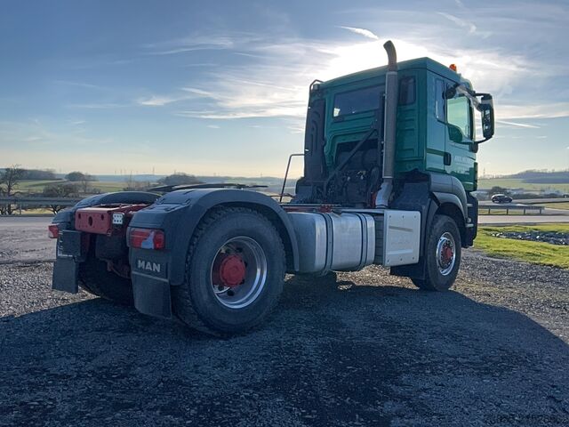 Kipper MAN TGS 18.500 4x4H BLS with 2010 Kempf SKM 31/2 SR tipper semi-trailer