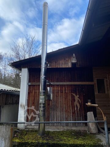 Heating system for wood and wood chips EWI Therm Optimat-E-Gr.1