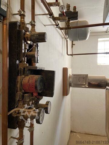 Heating system for wood and wood chips EWI Therm Optimat-E-Gr.1
