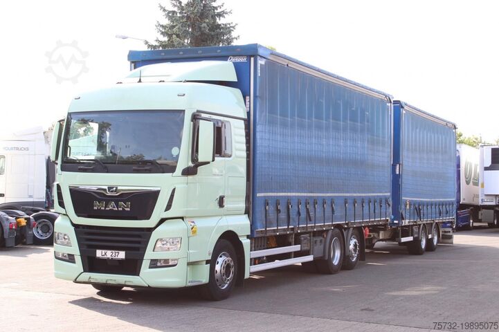 Flatbed truck with tarp MAN TGX 26.460 Retarder Plane-Zug 120M3 Durchlade