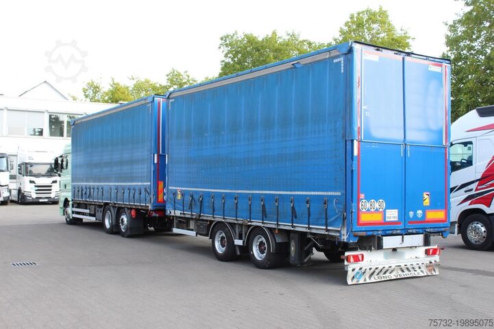 Flatbed truck with tarp MAN TGX 26.460 Retarder Plane-Zug 120M3 Durchlade