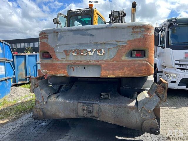 Raupenbagger Volvo EW160B wheeled machine w/ support leg and shear