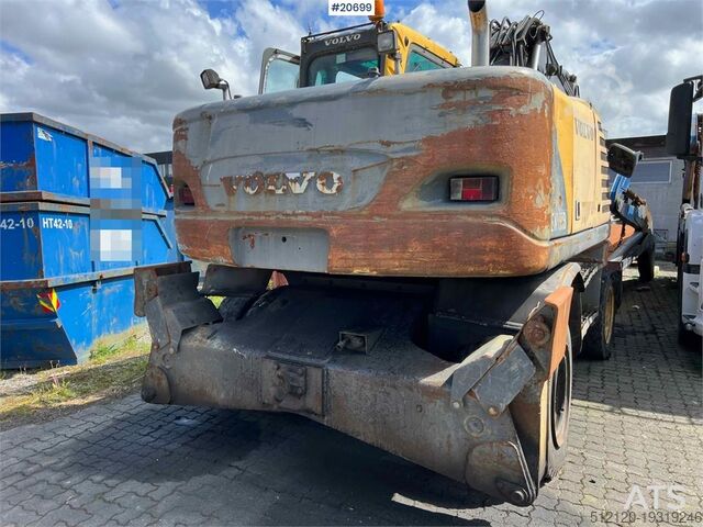 Raupenbagger Volvo EW160B wheeled machine w/ support leg and shear