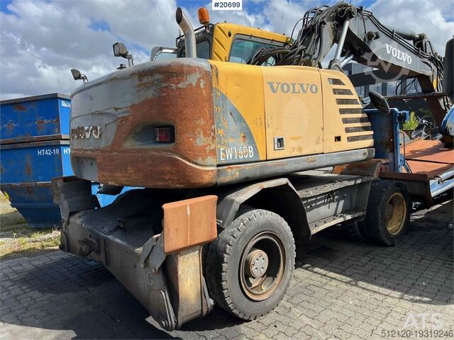 Crawler excavator Volvo EW160B wheeled machine w/ support leg and shear