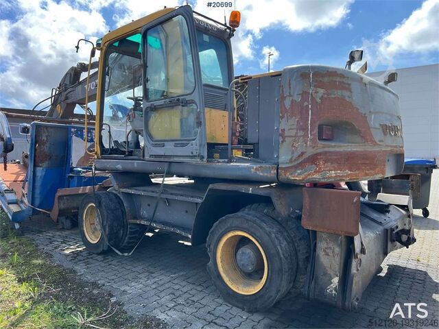 Crawler excavator Volvo EW160B wheeled machine w/ support leg and shear