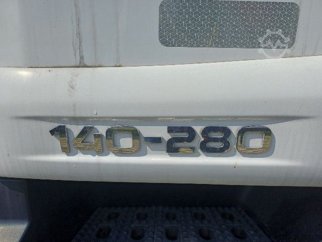 Flatbed truck with tarp IVECO EUROCARGO ML140E28