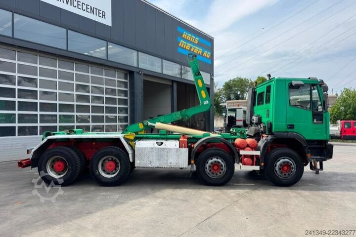 Roll-off tipper truck IVECO Trakker 440 8x4 UT