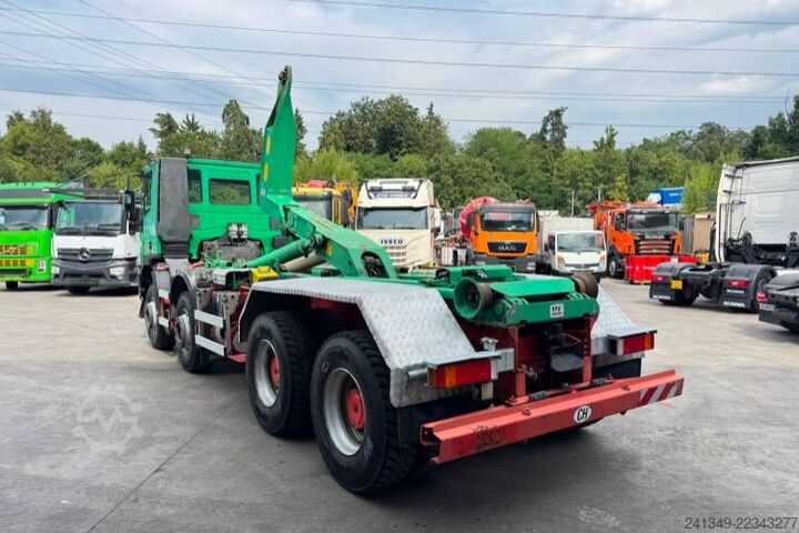 Roll-off tipper truck IVECO Trakker 440 8x4 UT
