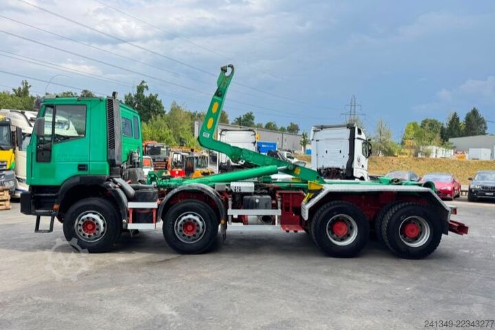 Roll-off tipper truck IVECO Trakker 440 8x4 UT