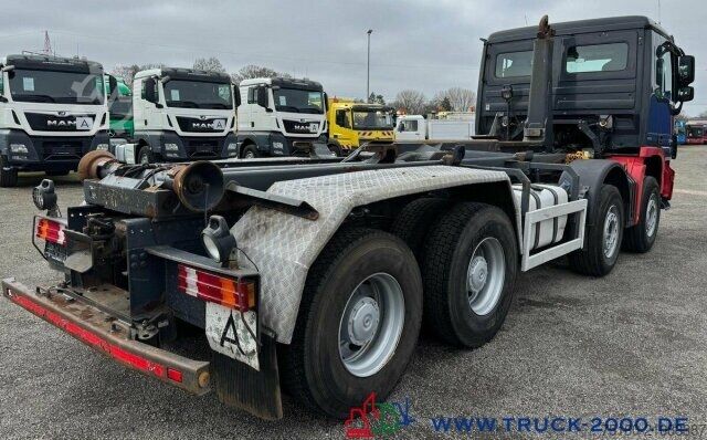 Roll-off tipper truck Mercedes-Benz Actros 3244 8x4 Meiller 30t.7m Container Blatt