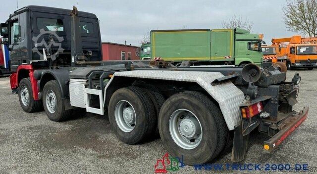 Roll-off tipper truck Mercedes-Benz Actros 3244 8x4 Meiller 30t.7m Container Blatt