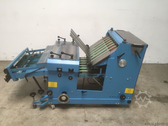 Upright stack delivery wit pressing unit Desta B 5000