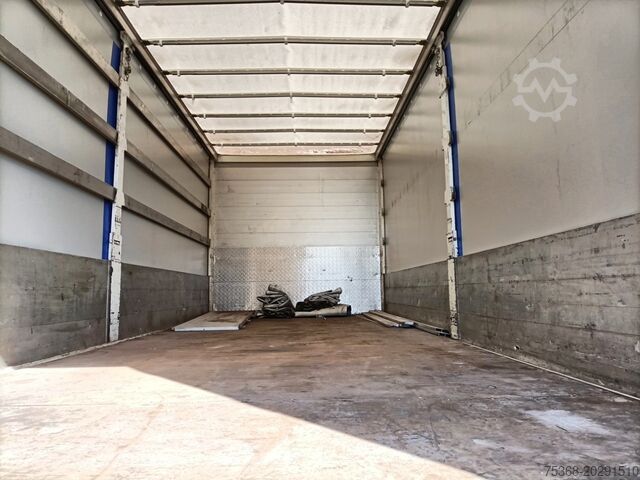 Truck with flatbed and tarpaulin DAF LF 310