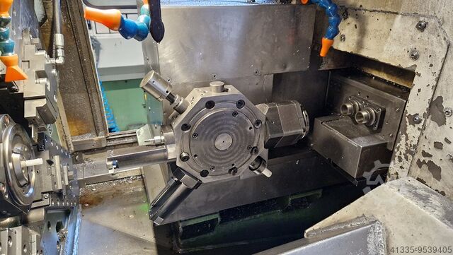 CNC lathe with barfeeder TRAUB TNM 42