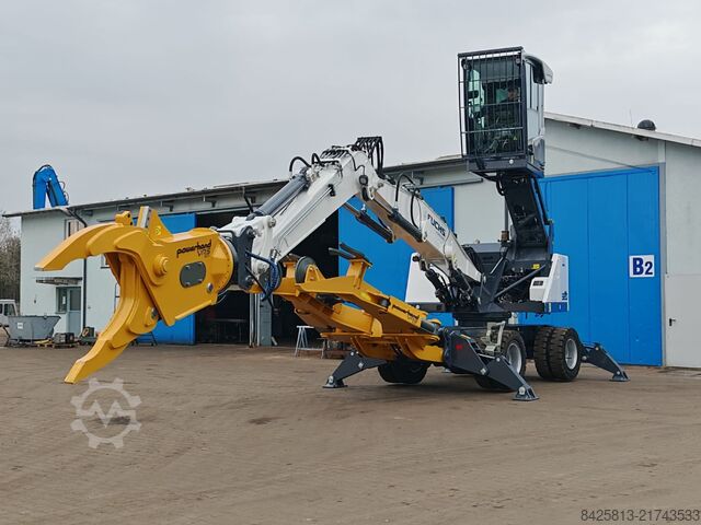 Material handler Fuchs MHL 320 F inkl. Powerhand VRS 200