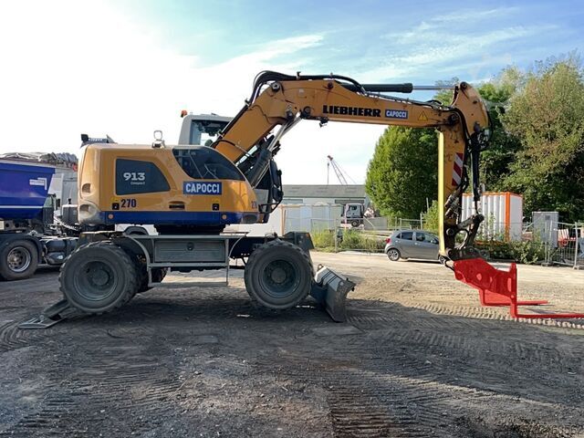 Wheeled Excavator Liebherr A913 Compact Litronic with 3 excavator buckets