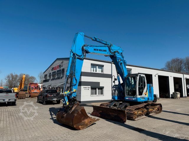 Kettenbagger NEW HOLLAND Kobelco E235 BSR-2 Nullheck Versteller MS21
