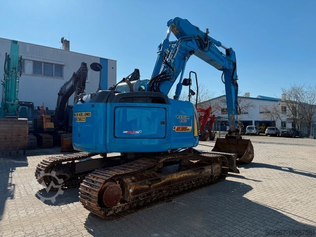 Kettenbagger NEW HOLLAND Kobelco E235 BSR-2 Nullheck Versteller MS21