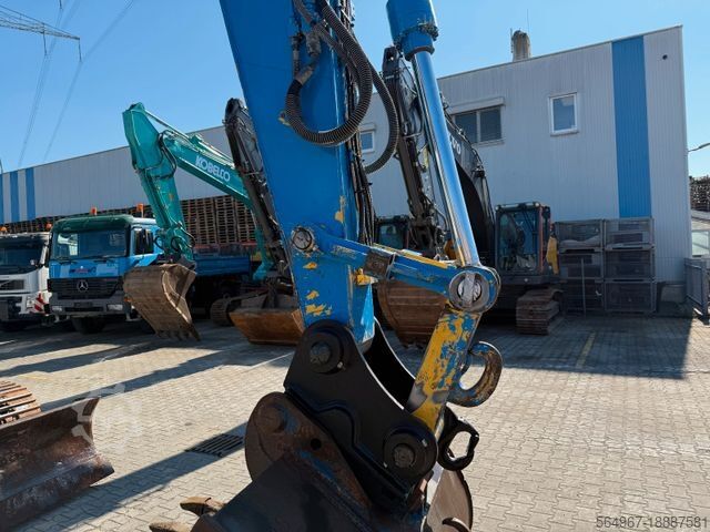 Kettenbagger NEW HOLLAND Kobelco E235 BSR-2 Nullheck Versteller MS21