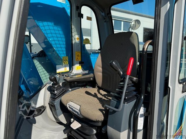 Kettenbagger NEW HOLLAND Kobelco E235 BSR-2 Nullheck Versteller MS21