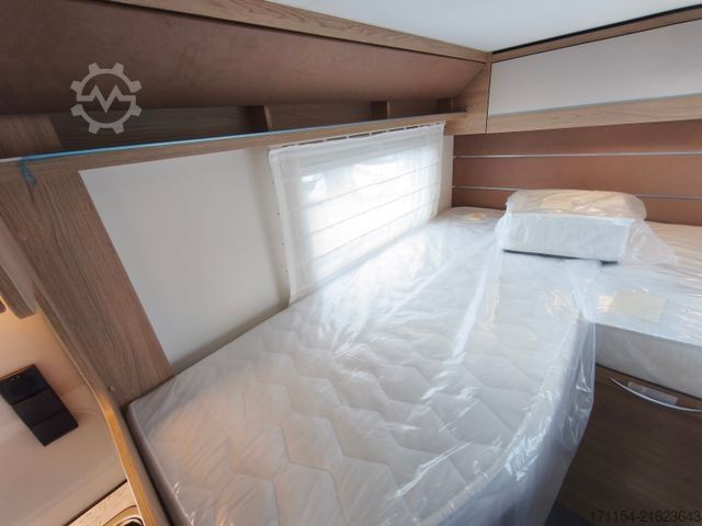 Teilintegriertes Wohnmobil LMC Cruiser V 646 G,  Längsbetten, Navi,Automatik