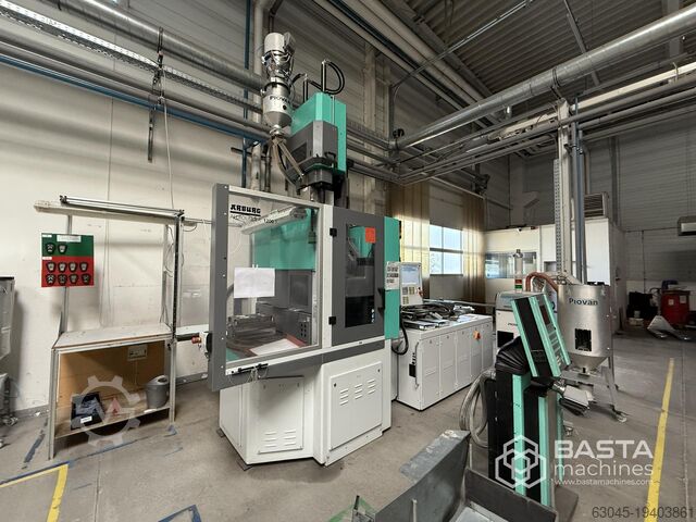 Arburg 1200T 2000-800 (vertical, rotary table,working hours: 9.562) Arburg 1200 T 2000-800