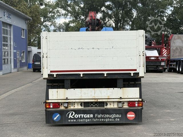Flatbed truck MAN TGX 26.470 Euro 6 Abrollkipper mit Ladekran