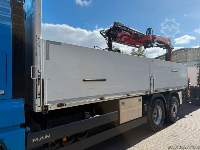 Flatbed truck MAN TGX 26.470 Euro 6 Abrollkipper mit Ladekran